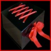 2012 gloss lamination foldable gift paper box with red ribbon