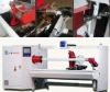 Adhesive tape roll slitting machine