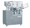 Aluminum tube filling and sealing machine