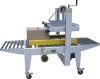 Automatic box sealing machinery