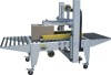 Automatic carton sealing machine