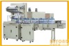 Automatic shrink wrapping machine