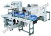 Automatic sleeve shrink packer for bottles