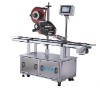 Automatic top label attaching machine