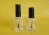 Clear epmty round glass nail polish bottle