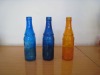 Colouring beverage glass bottles