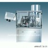 Comestic filling and sealing machine