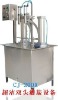 Double headed piston liquid filling machine