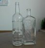 Embossed glass bottle