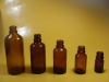 Essential oil bottle in brown