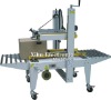 FXJ-6050 Top & Bottom Driven Carton Sealing Machine