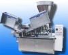 Filling and sealing machine