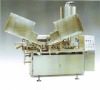 Filling and sealing machine