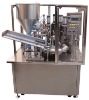 Filling and sealing machine