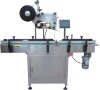 Fully- automatic beverage bottle labeler