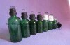 Green Glass Bottle with tamper evident cap for essential oil