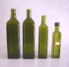 Green glass olive oil bottle