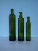 Green round glass bottle