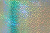 Holographic self adhesive material