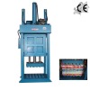 Hydraulic cloth compress baler