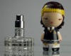 PERFUME BOTTLE WITH DOLL CAP