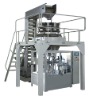 Packing machine with multihead weigher