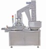 Plastic cap lining machine