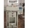 Pneumatic type valve mouth packaging machine