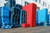 Red nestable plastic pallet