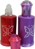 Red perfume bottle with butterflt-shape beading