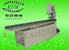 Roll toilet paper cutting machine