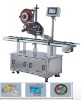 Self adhesive Top labeling system