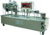 Soft bottle/tube filling & sealing machine