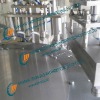 Stand up pouch filling and sealing machine