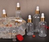 Transparent essential oil glass bottle with dropper