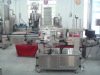 Two side labelling machine