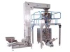 Vertical feed filling and packing machine