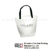 White paper bag with black plastic handle