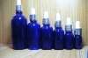 blue essential oil bottle