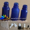 blue essential oil bottle