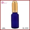 blue essential oil bottle with aluminum dropper