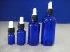 blue essential oil glass bottle