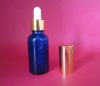 blue essential oil glass bottle