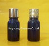 blue essential oil glass bottle with plastic cap