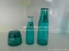 blue glass cosmetic bottle and jar