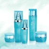 blue glass cosmetic bottles and jars with silver cap