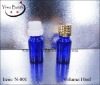 blue glass essential oil bottle