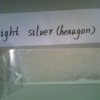 bright silver open void label