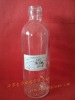 clear beverage glass bottle