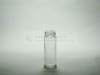 clear beverage glass bottle